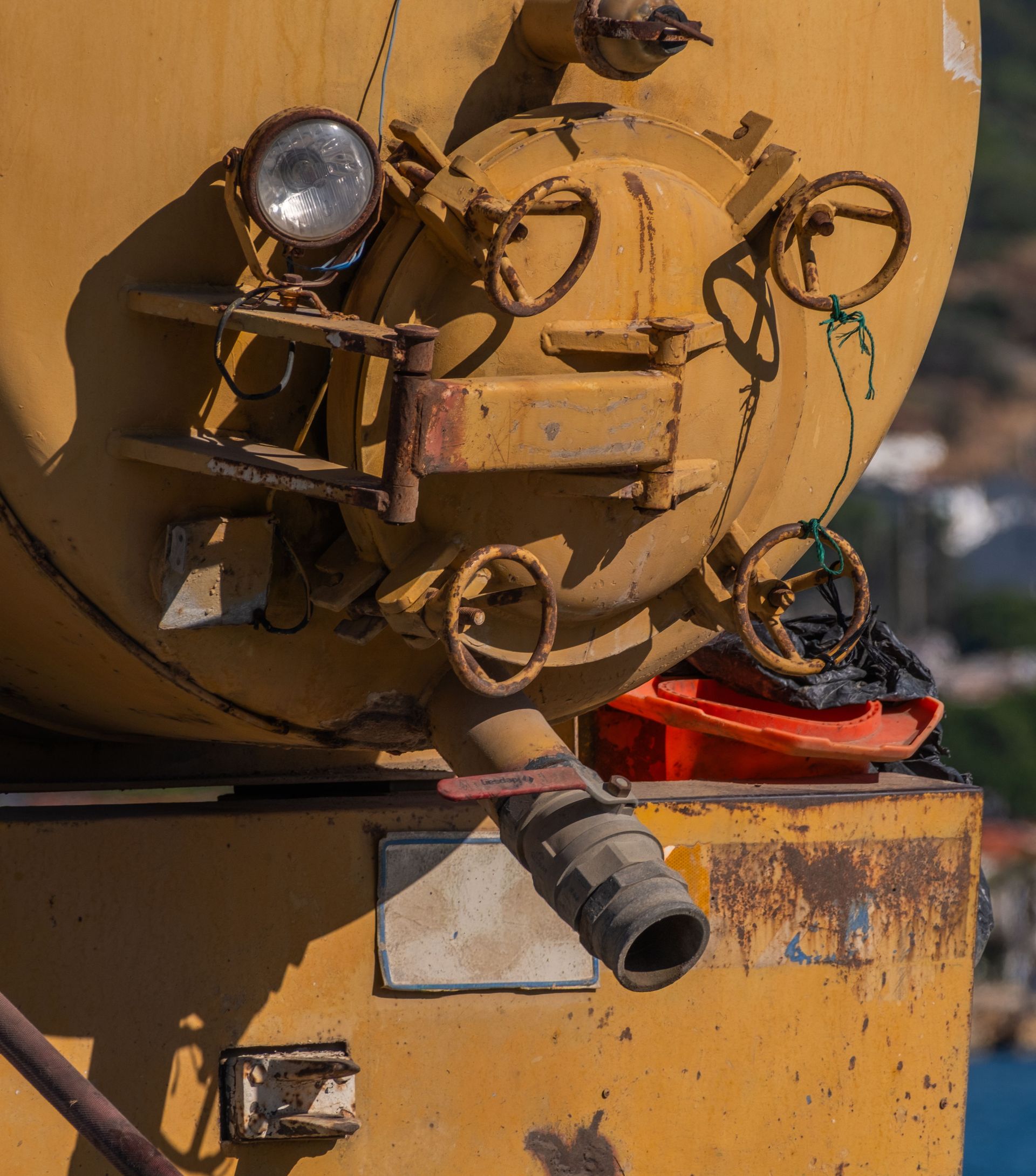 Close-up of rusty industrial machinery outdoors in Foça, İzmir, Türkiye.
